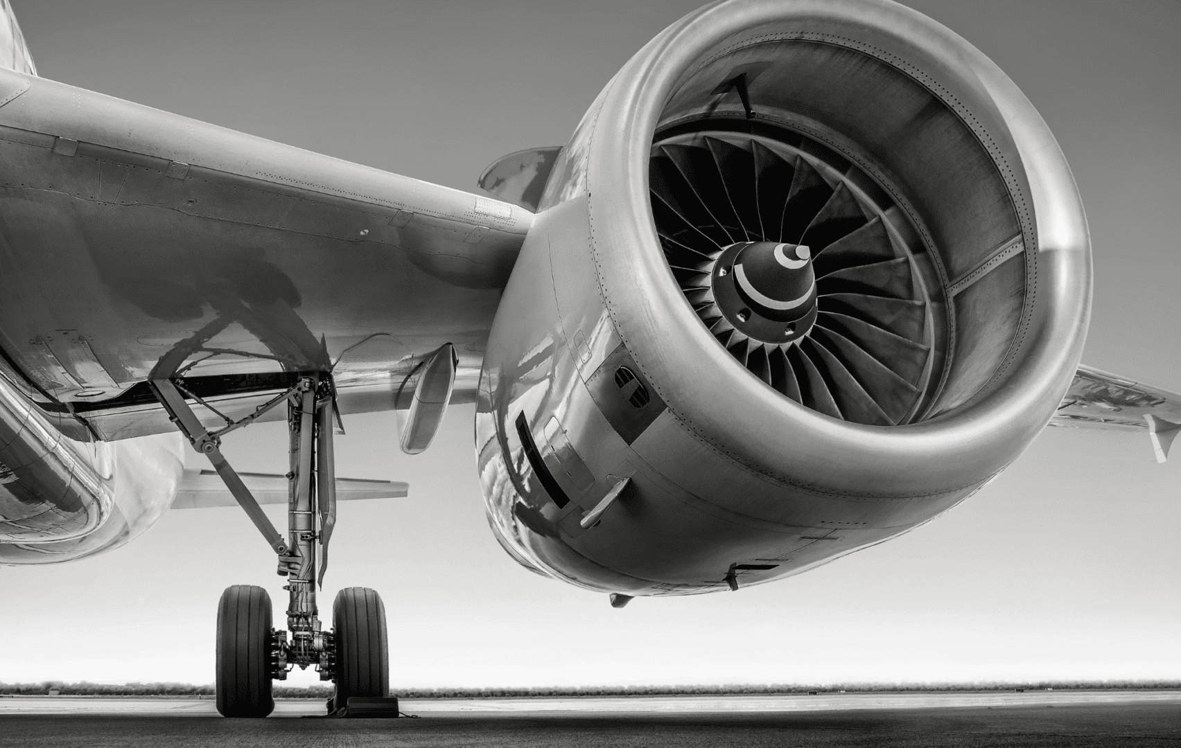 A close up of the underside of an airplane.