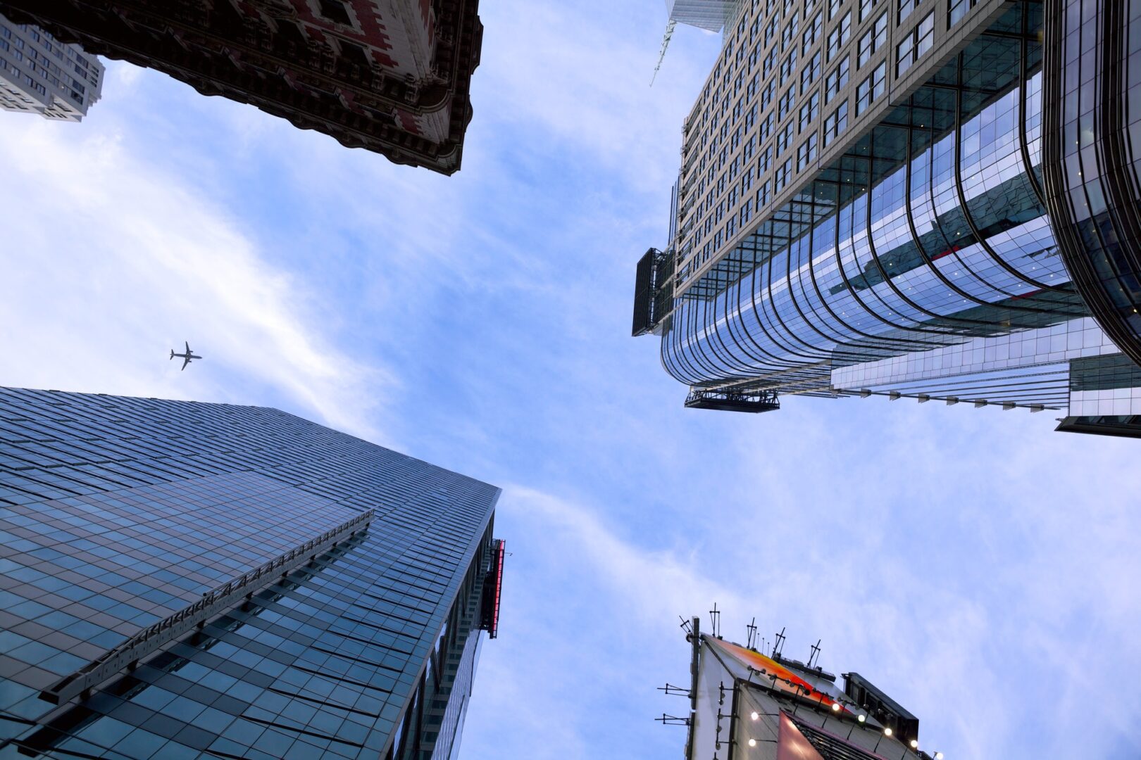 A view of some buildings from below looking up.